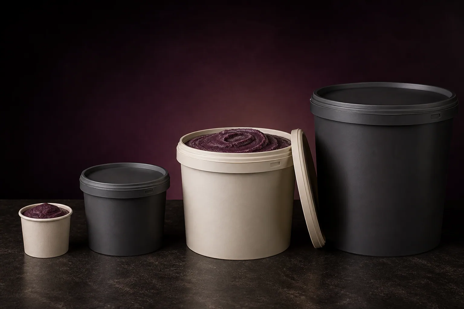 Neutral açaí sorbet containers shown from tasting cup to large food-service tub